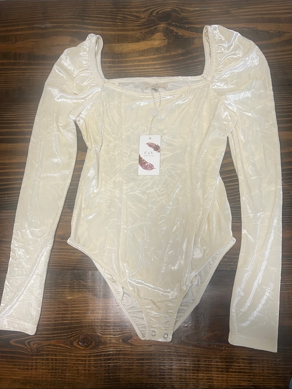 Chelsea & Violet Ivory Long Sleeve Bodysuit